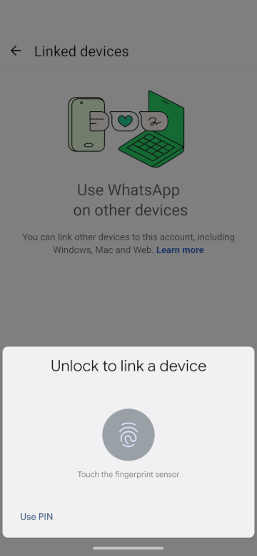 The agent’s overlay requiring biometric authentication, while using it to add a WhatsApp device underneath